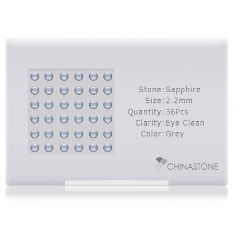 A perfectly calibrated lot of 36 high-precision cut natural sapphire gemstones, which are secured in a purpose-built box and accompanied by a Certificate of Authenticity. Each round shaped stone on average weighs 0.06 carat, measuring 2.2mm in length, 2.2mm in width and 1.43mm in depth, and features an exceptional cabochon cut and finish, along with an absolute minimum variance of color difference.